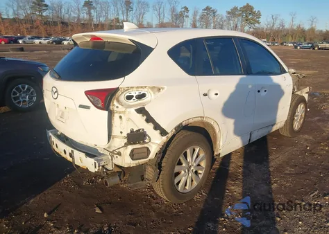 2014 Mazda Cx-5 Touring from USA, damaged, VIN JM3KE4CY7E0384652